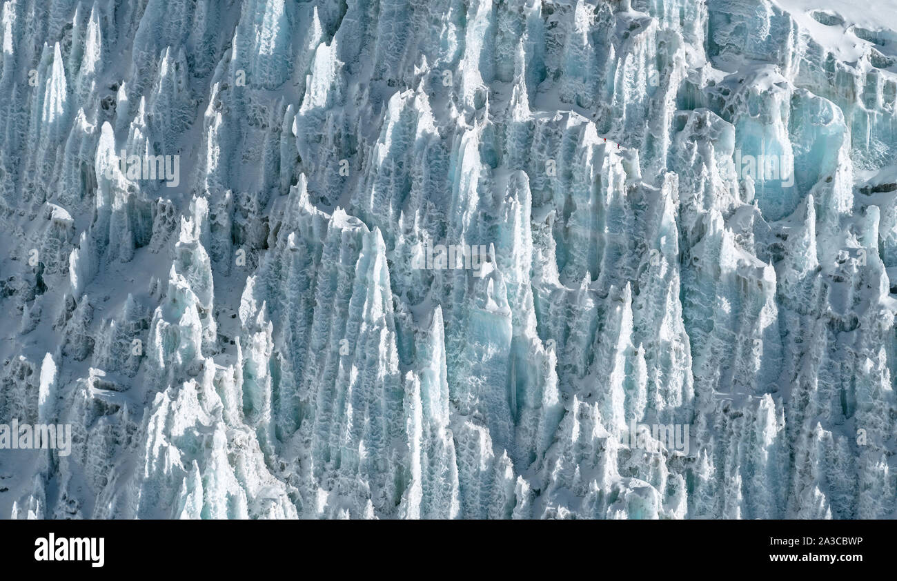 Aerial view of Khumbu icefall with group of alpinists. Everest peak ...