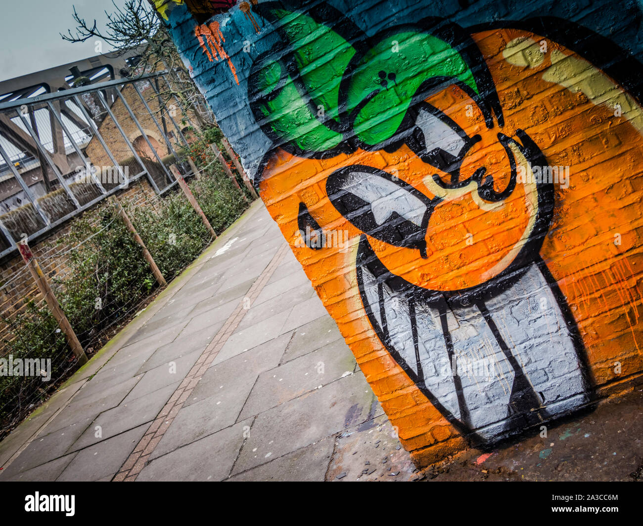 graffiti on the walls in and around Brick Lane in London's East End. Stock Photo