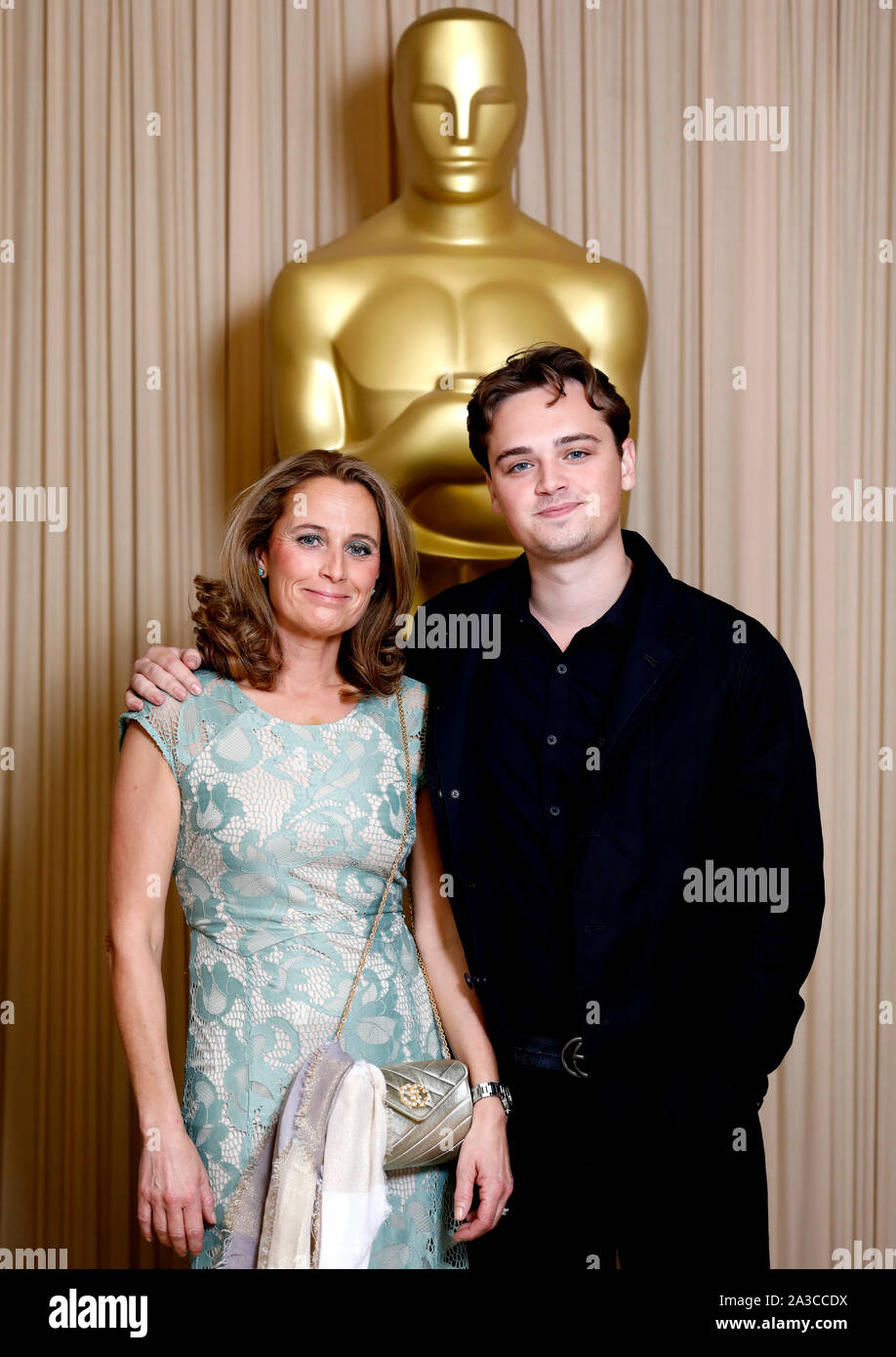 Elizabeth Rebecca Chapman and Dean-Charles Chapman attending the Academy of Motion Picture Arts and Sciences New Members Party 2019 held at the Freemasons Hall in London. Stock Photo