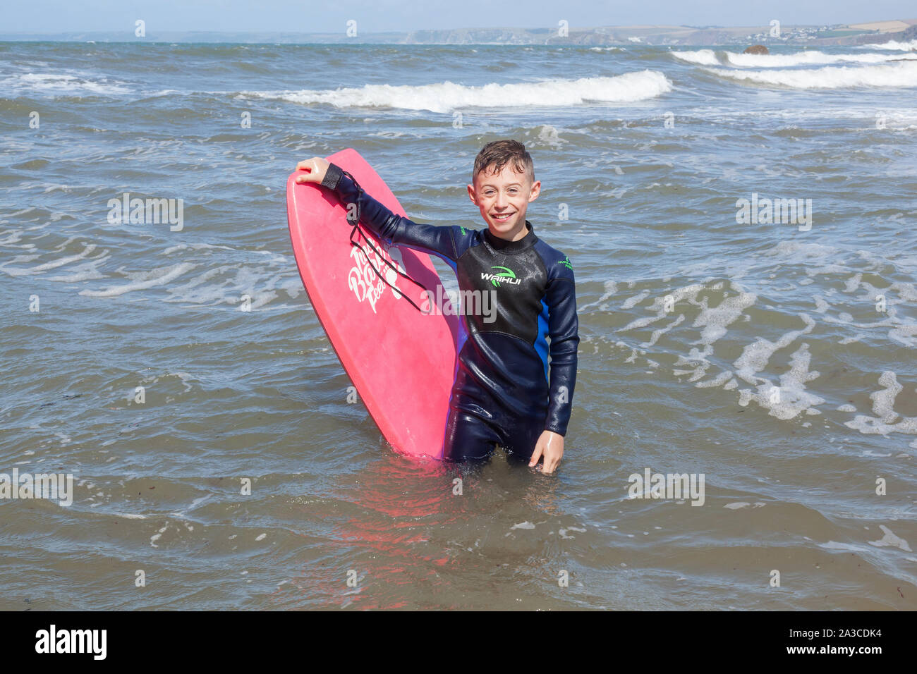 Boy Swimming Sea Wetsuit High Resolution Stock Photography and Images