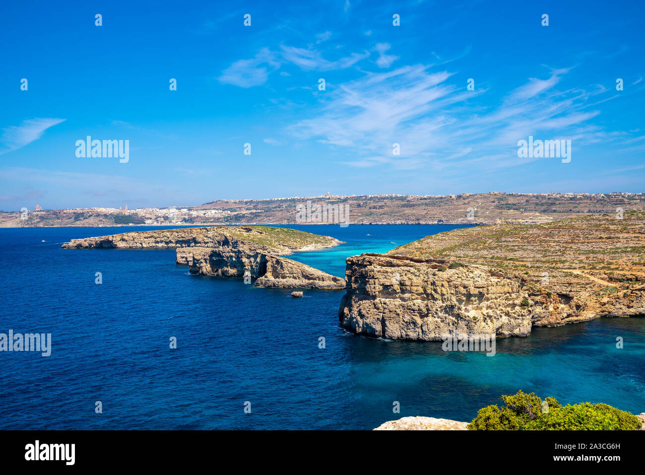 Stone cliffs on the blue lagoon of the island of Comino and Gozo Malta.  Mediterranean Sea Stock Photo - Alamy
