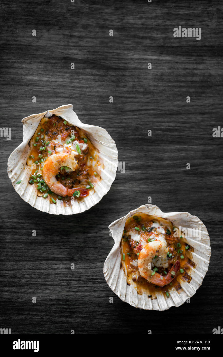 portuguese seafood grilled prawns tapas in spicy tomato piri piri sauce in lisbon restaurant