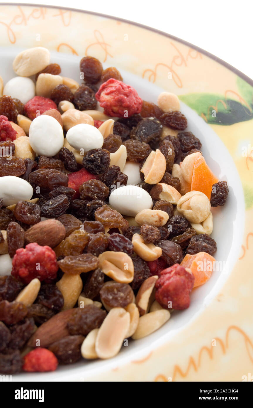 Mixed Nuts and Dried fruits in a Dish Close View Stock Photo