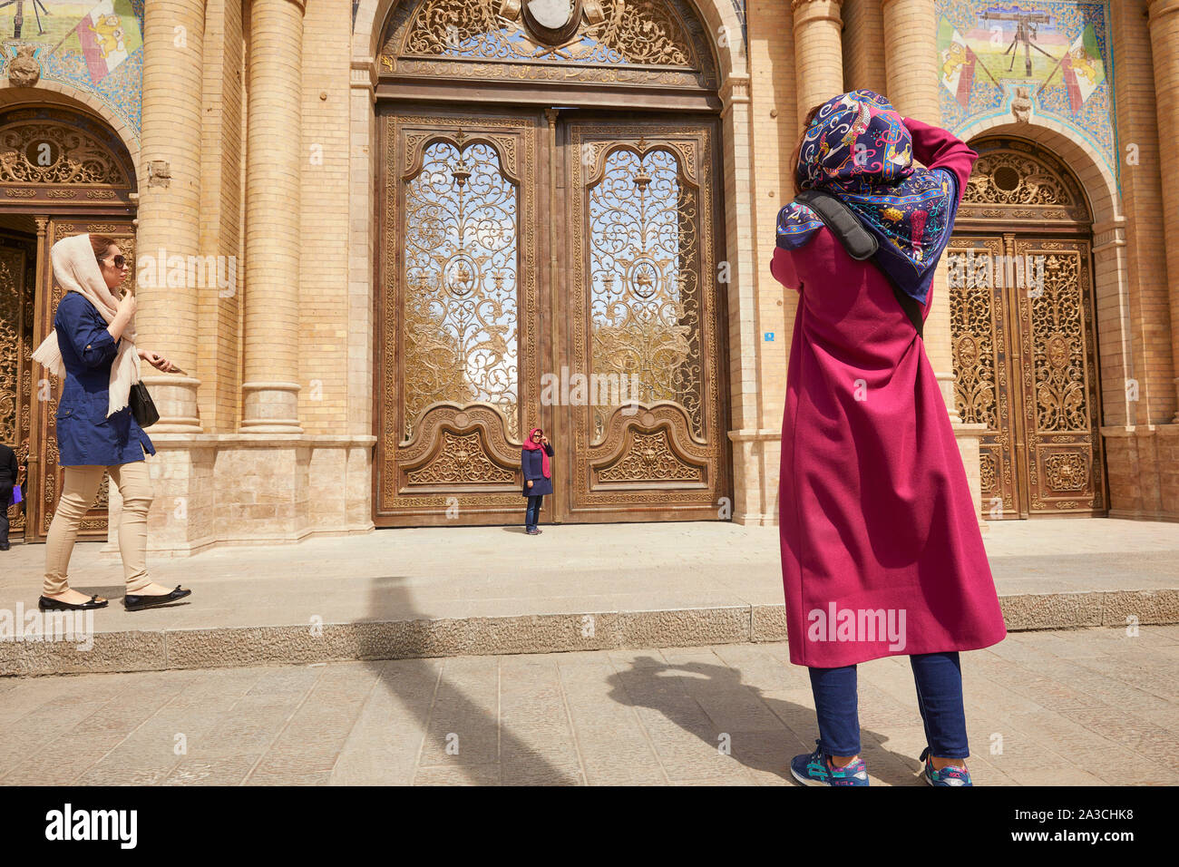 Iran Tehran Post museum making photographs in front of the big door  29-03-2017 foto: Jaco Klamer Stock Photo