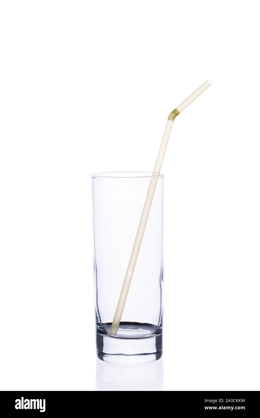 Empty glass cup with tube for juice on a white background isolate Stock  Photo - Alamy