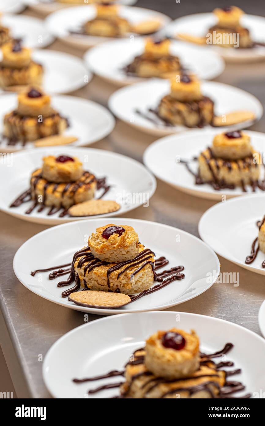 Baked rice cake dessert with chocolate sauce Stock Photo Alamy