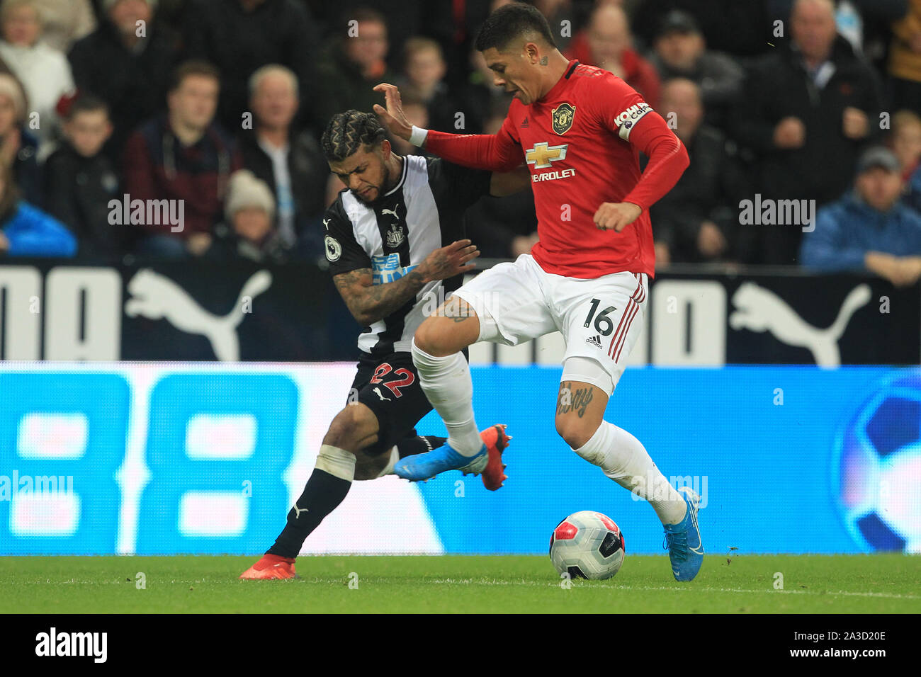 NEWCASTLE UPON TYNE, OCTOBER 6th DeAndre Yedlin of Newcastle United in action with Marcos Rojo of Manchester United during the Premier League match between Newcastle United and Manchester United at St. James's Park, Newcastle on Sunday 6th October 2019. (Credit: Mark Fletcher | MI News) Stock Photo