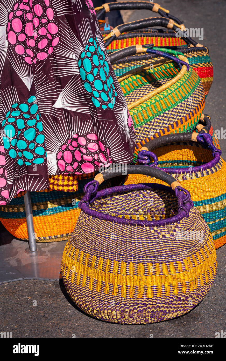 Authentic handmade West African baskets for sale at an outdoor market