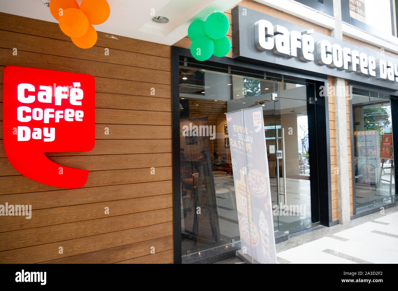 Cafe coffee day cafe with balloons decorating the front in an indoor