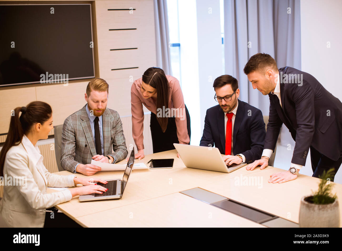 Group of business people working together in the modern office Stock ...