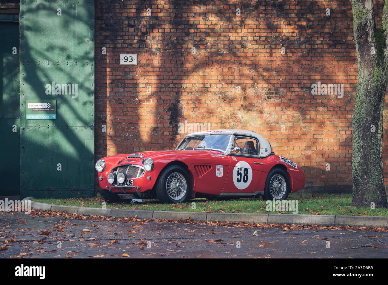 1962 Austin Healey car at Bicester heritage centre autumn sunday scramble event. Bicester, Oxfordshire, UK. Vintage filter applied Stock Photo