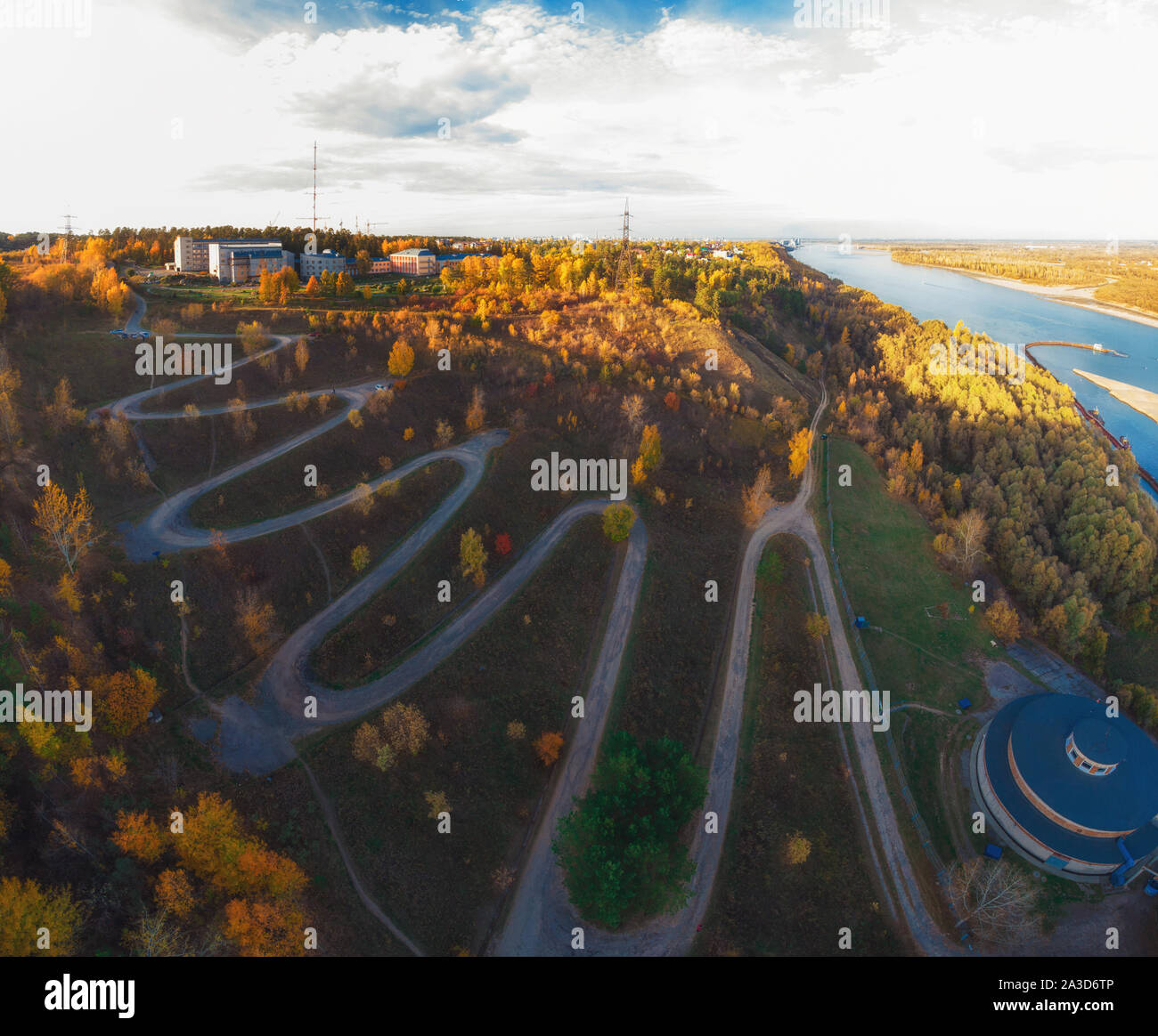 Aerial fly over winding road hi-res stock photography and images - Alamy