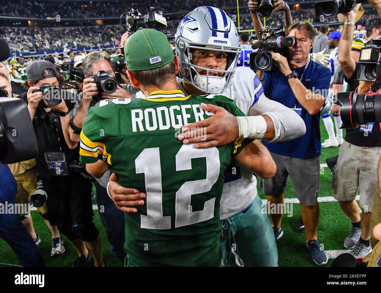 Oct 6, 2019: Dallas Cowboys quarterback Dak Prescott #4 hugs Green Bay  Packers quarterback Aaron Rodgers #12 after an NFL game between the Green  Bay Packers and the Dallas Cowboys at AT&T