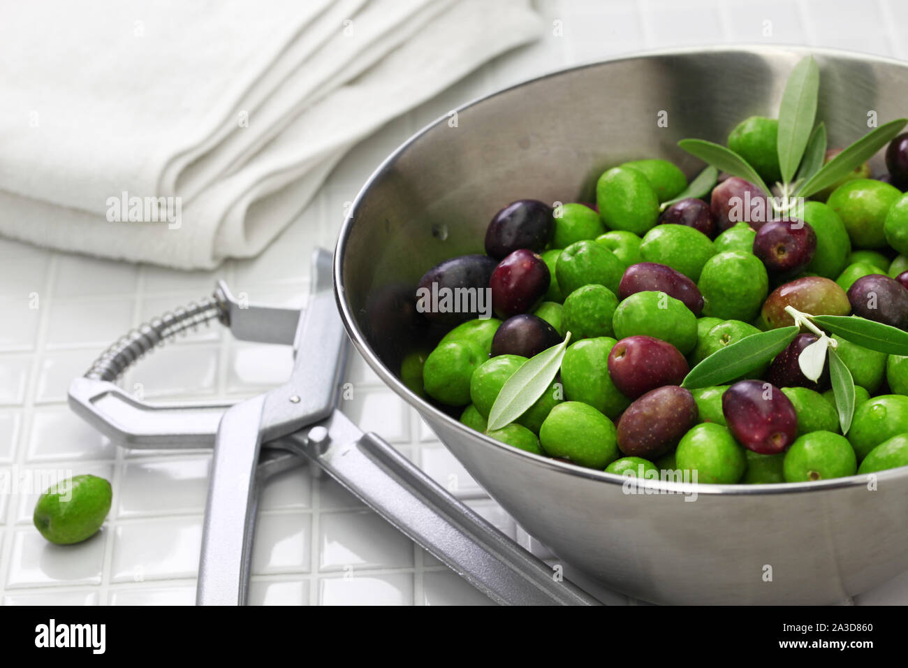 how to remove an olive pit Stock Photo Alamy