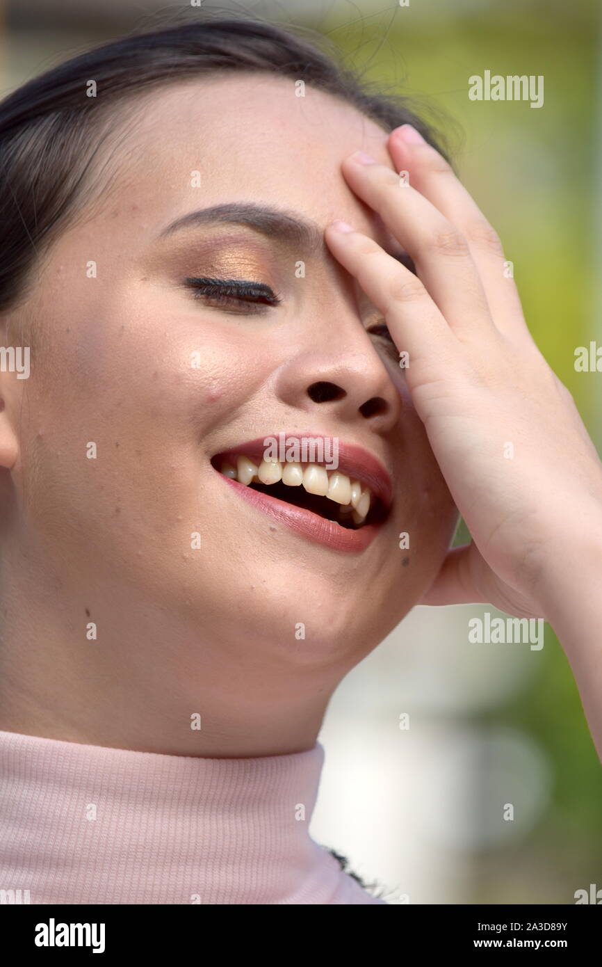 An Attractive Adult Female Laughing Stock Photo