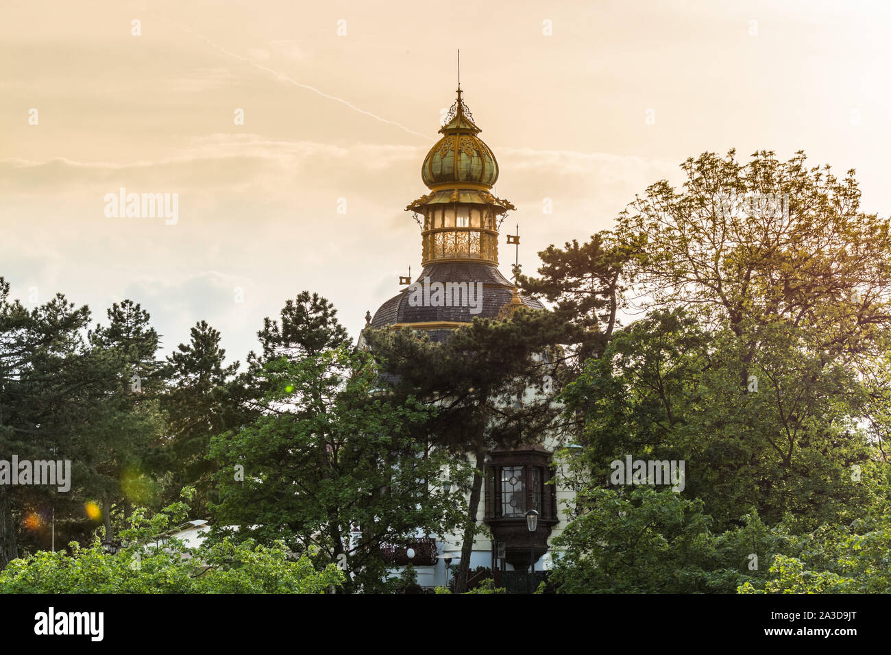 A glass dome of  Hanavsky Pavilon or (Pavilion of Hanau)in Letna Park, Prague, Czech Republic under the sunset. Stock Photo