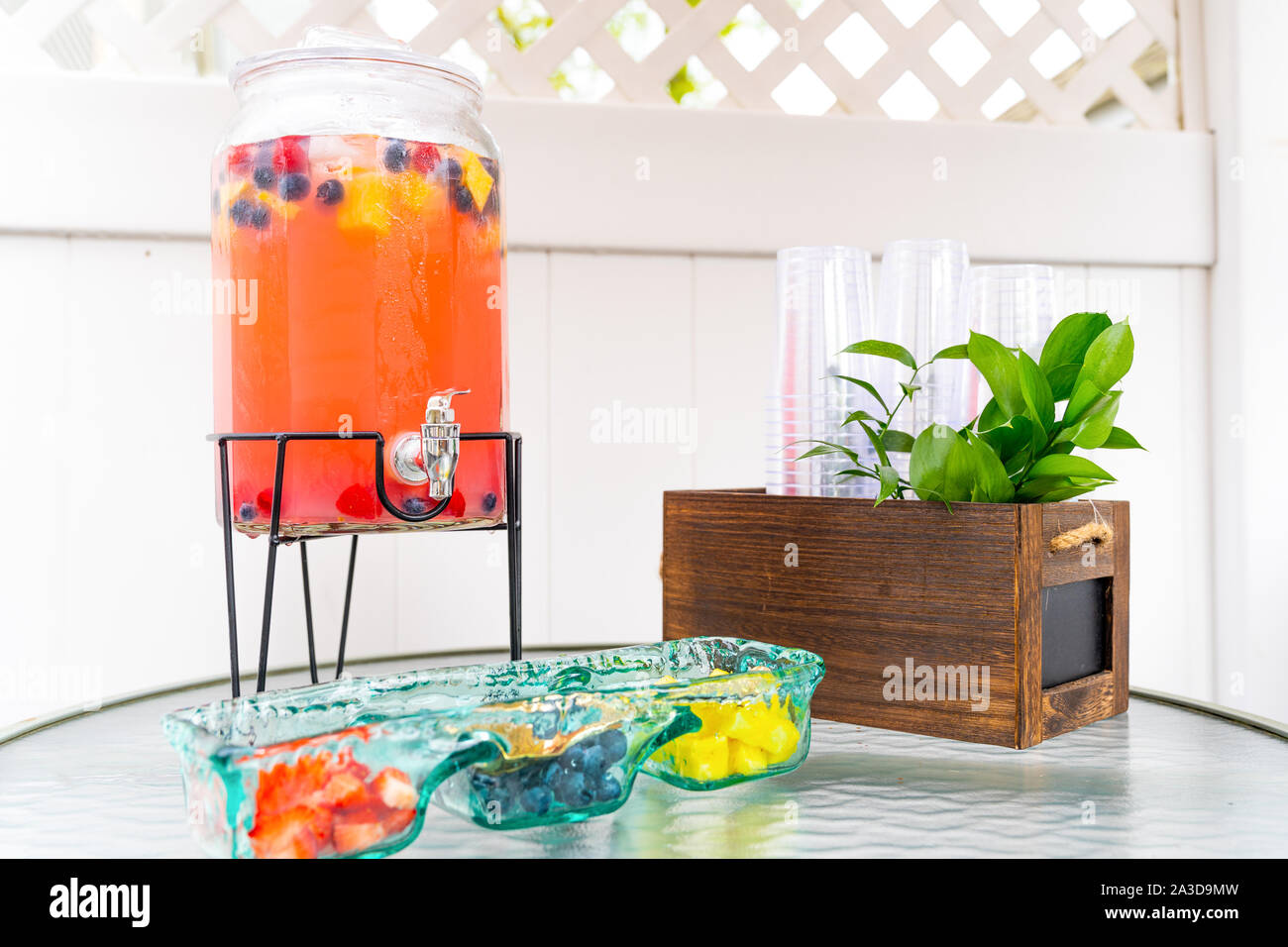 Cute Summer Table Setting with Lemonade and Fruits. Stock Photo