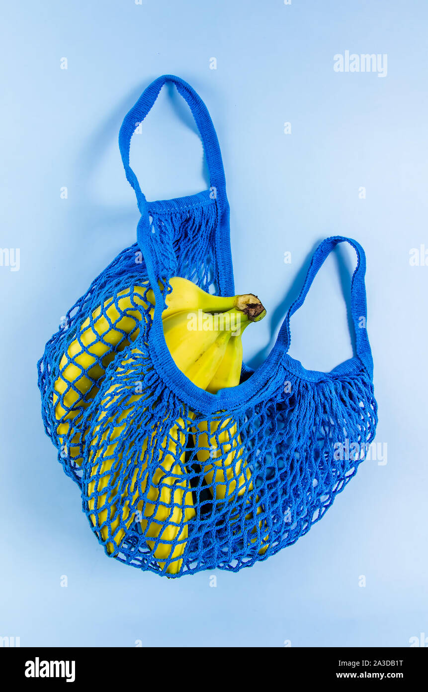 bananas in a blue bag. no plastic, free plastic Stock Photo Alamy