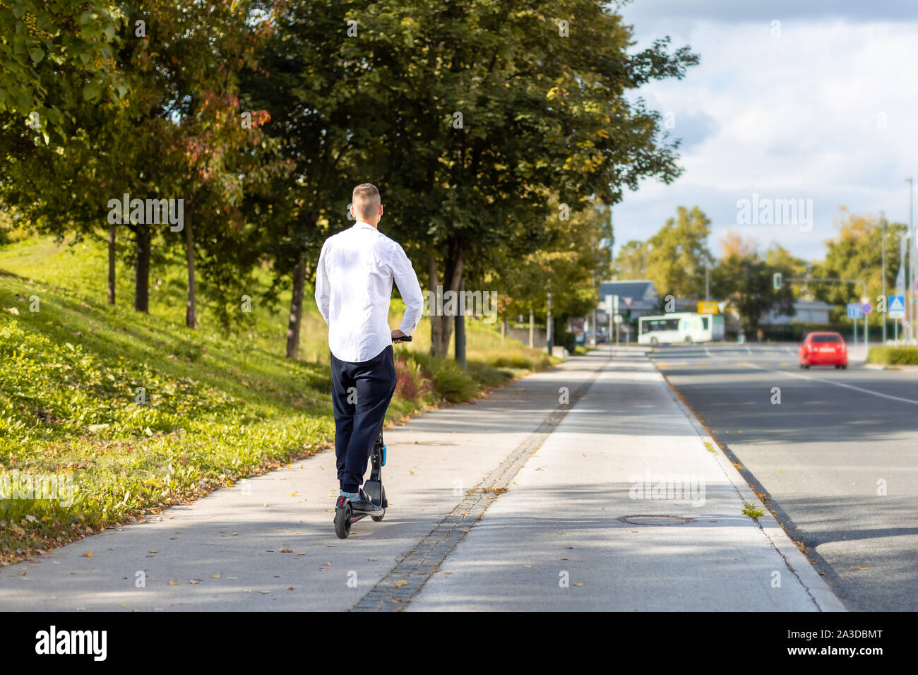 Man riding e scooter hi-res stock photography and images - Alamy
