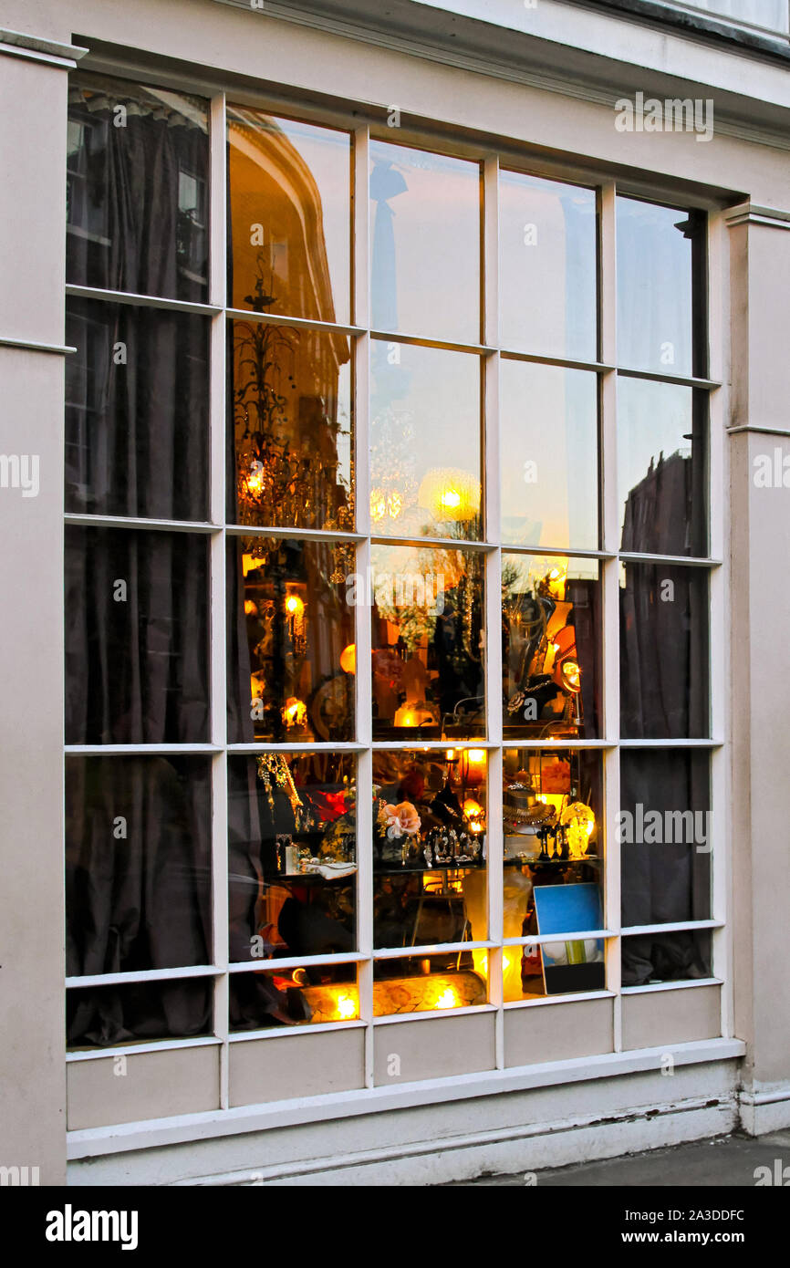 Christmas lights and decoration through big window Stock Photo