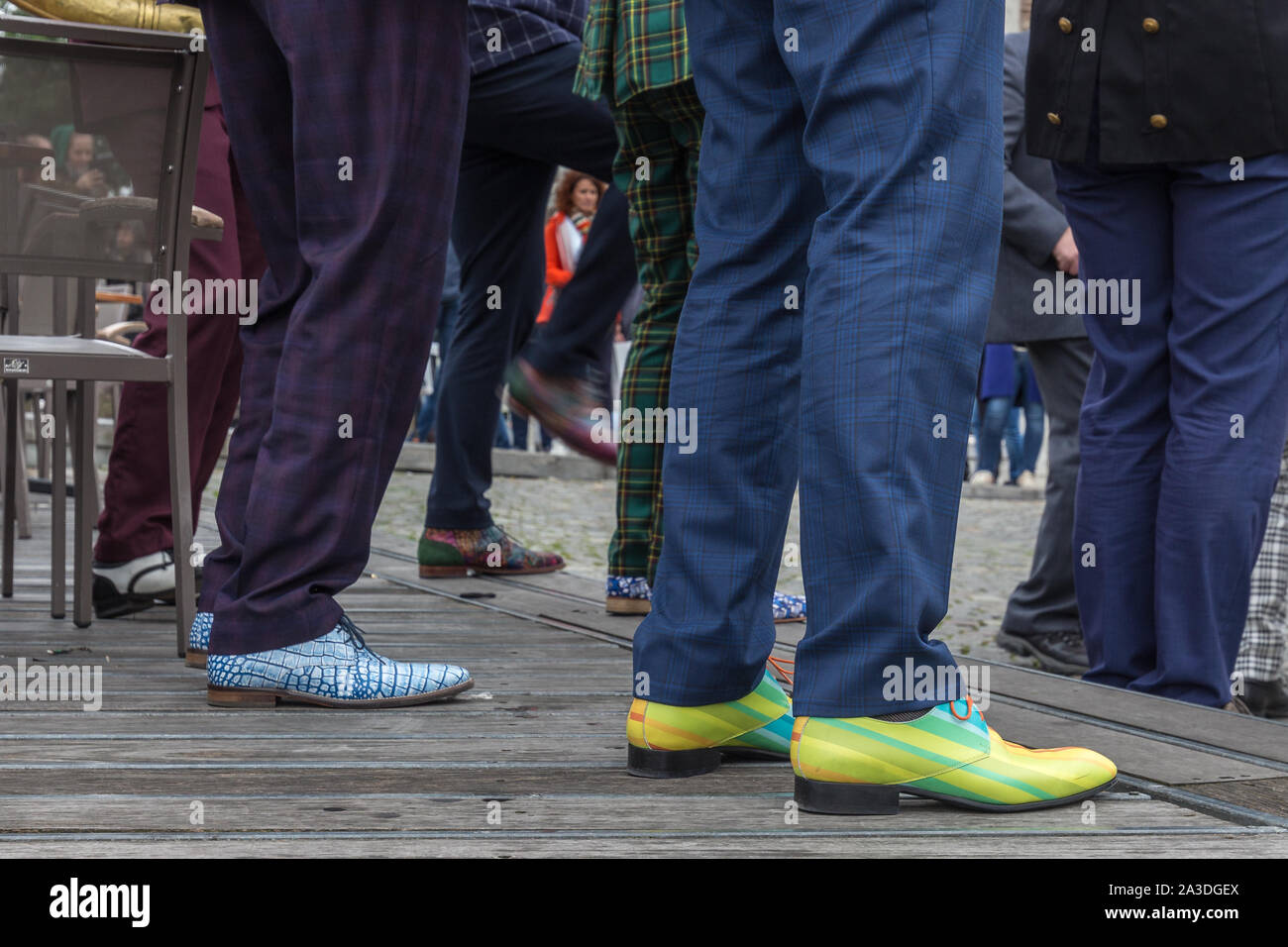 colorful shoes in downtown Maastricht, created by a local company Art Shoe  Mafia which was set up in 2013 by Meulenhoff Schoenen Stock Photo - Alamy
