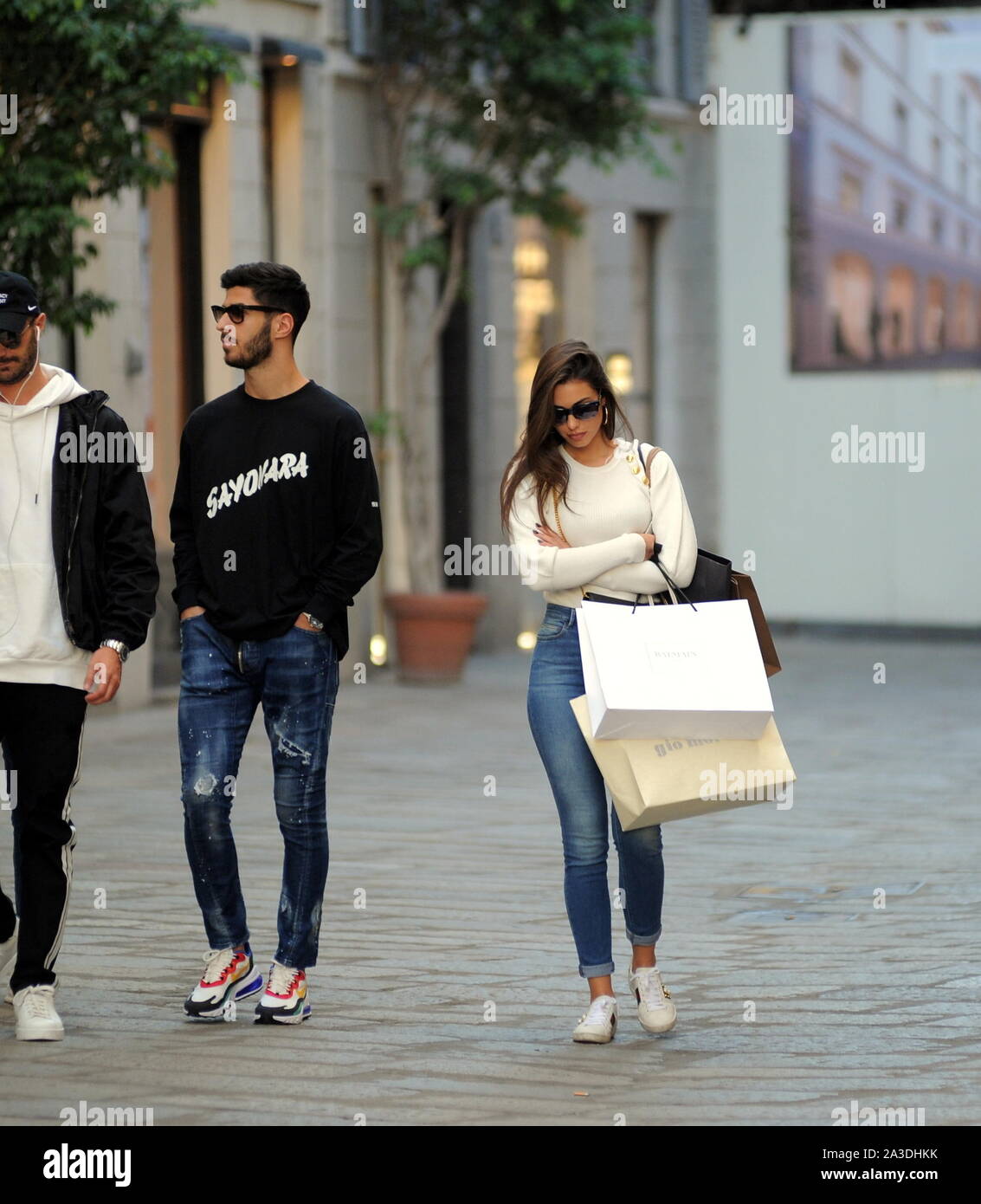 Milan Marco Asensio And Girlfriend Sandra Garal In The Center Marco Asensio Footballer Of Real Madrid And Of The National Spain Caught Walking Around The Downtown Streets Here He Goes Shopping In