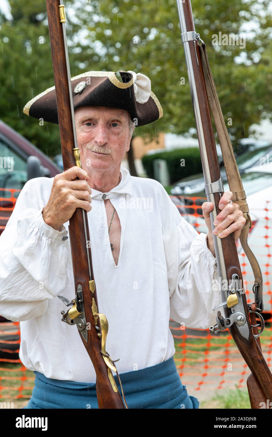 Detroit, Michigan - A member of the Belletre French Marines holds muskets as the Ste. Anne Parish de Detroit holds its third annual Rendez-vous cultur Stock Photo