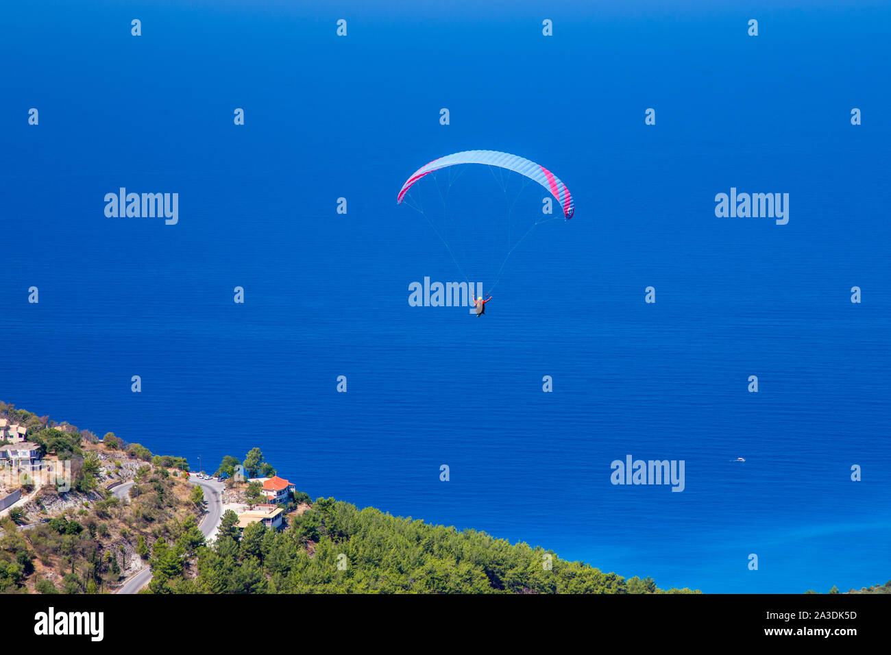 Tandem paragliding from Exanthia on Lefkada / Lefkas Island, Greece Stock Photo