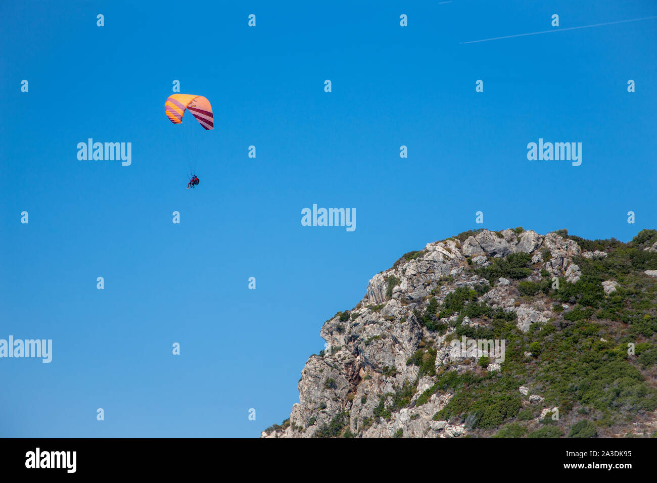 Tandem paragliding from Exanthia on Lefkada / Lefkas Island, Greece Stock Photo
