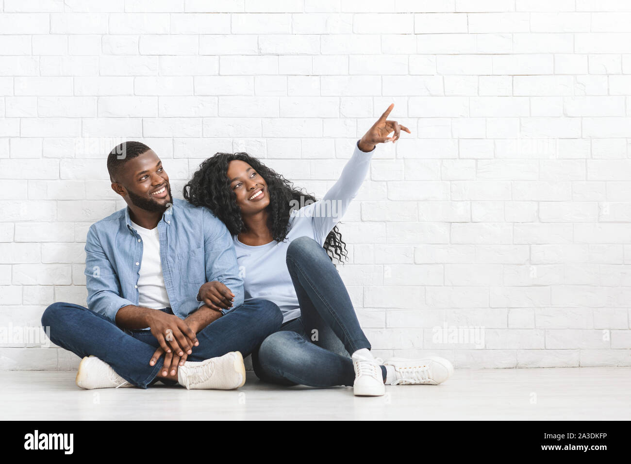 Black couple renovating house hi-res stock photography and images - Alamy