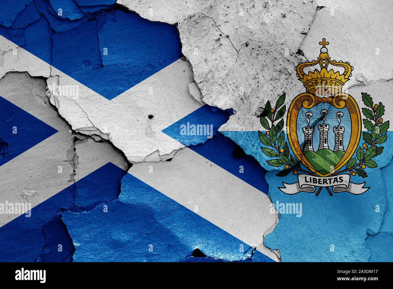 flags of Scotland and San Marino painted on cracked wall Stock Photo ...