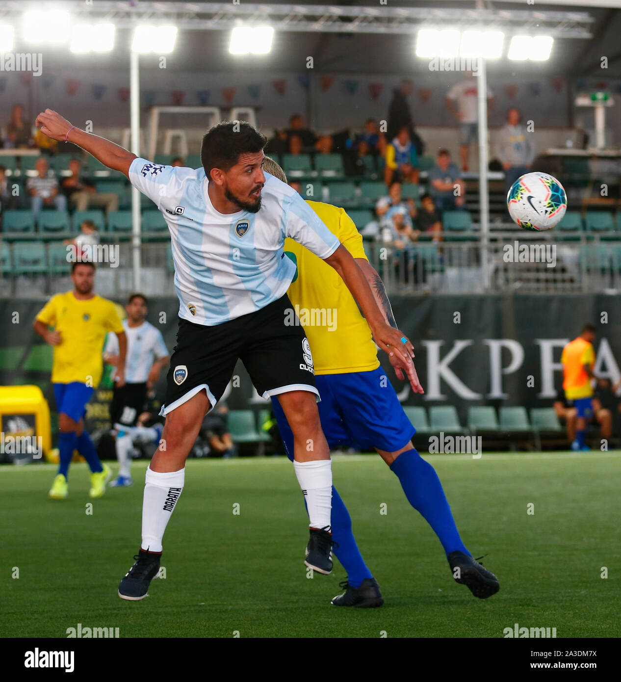 7th October 2019; Langley Park, Perth, Western Australia, Australia; World Mini Football Federation World Cup; Brazil versus Argentina, Julio Federico Tabera Saravia of Argentina wins the header against Thiago Conclaves of Brazil - Editorial Use Stock Photo