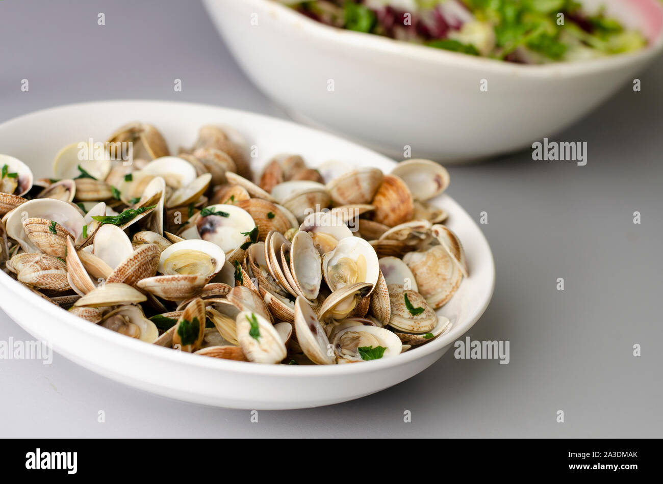 Clams steamed in a white wine. Italian cuisine Stock Photo Alamy