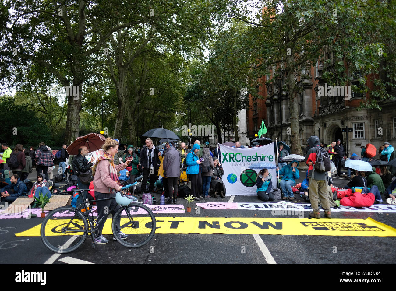 Westminster, London, UK - Monday 7th October 2019 - Extinction Rebellion XR climate protesters block the width of Millbank close to Parliament on Day 1 of the XR protest. Photo Steven May / Alamy Live News Stock Photo
