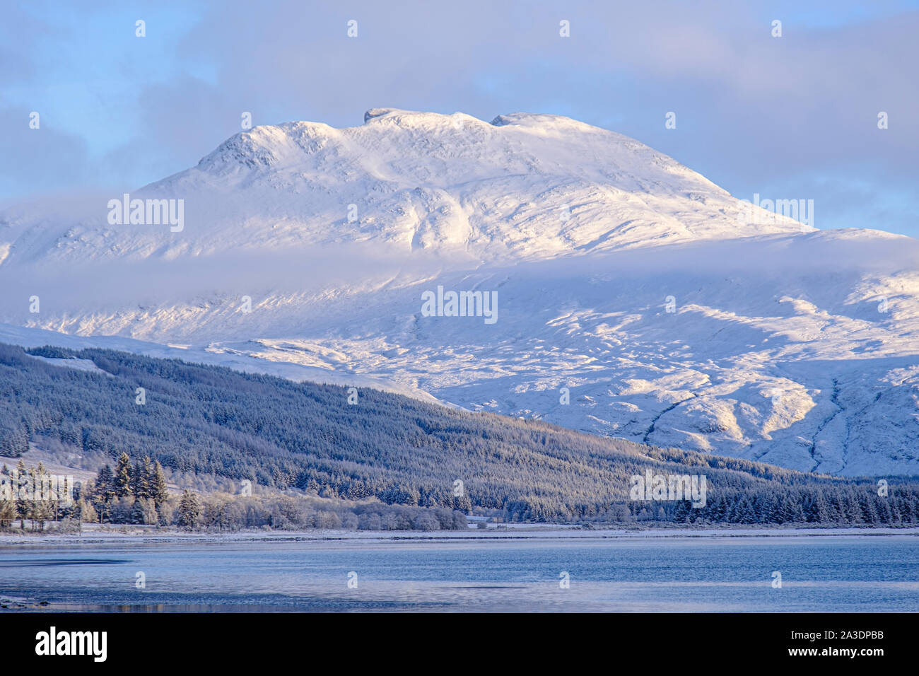Snow on Fuar Tholl (known locally as Wellingtons Nos) near Achnashellach, Wester Ross, NW Highlands of Scotland, from the jetty in Lochcarron village. Stock Photo