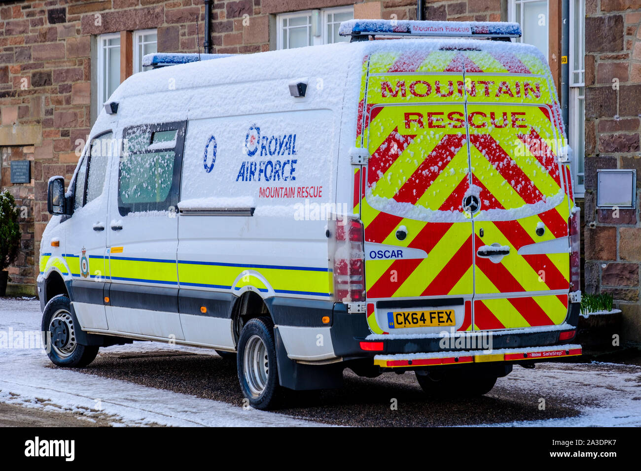 RAF Mountain Rescue vehicle 'Oscar' parked and covered in snow in Highlands of Scotland Stock Photo