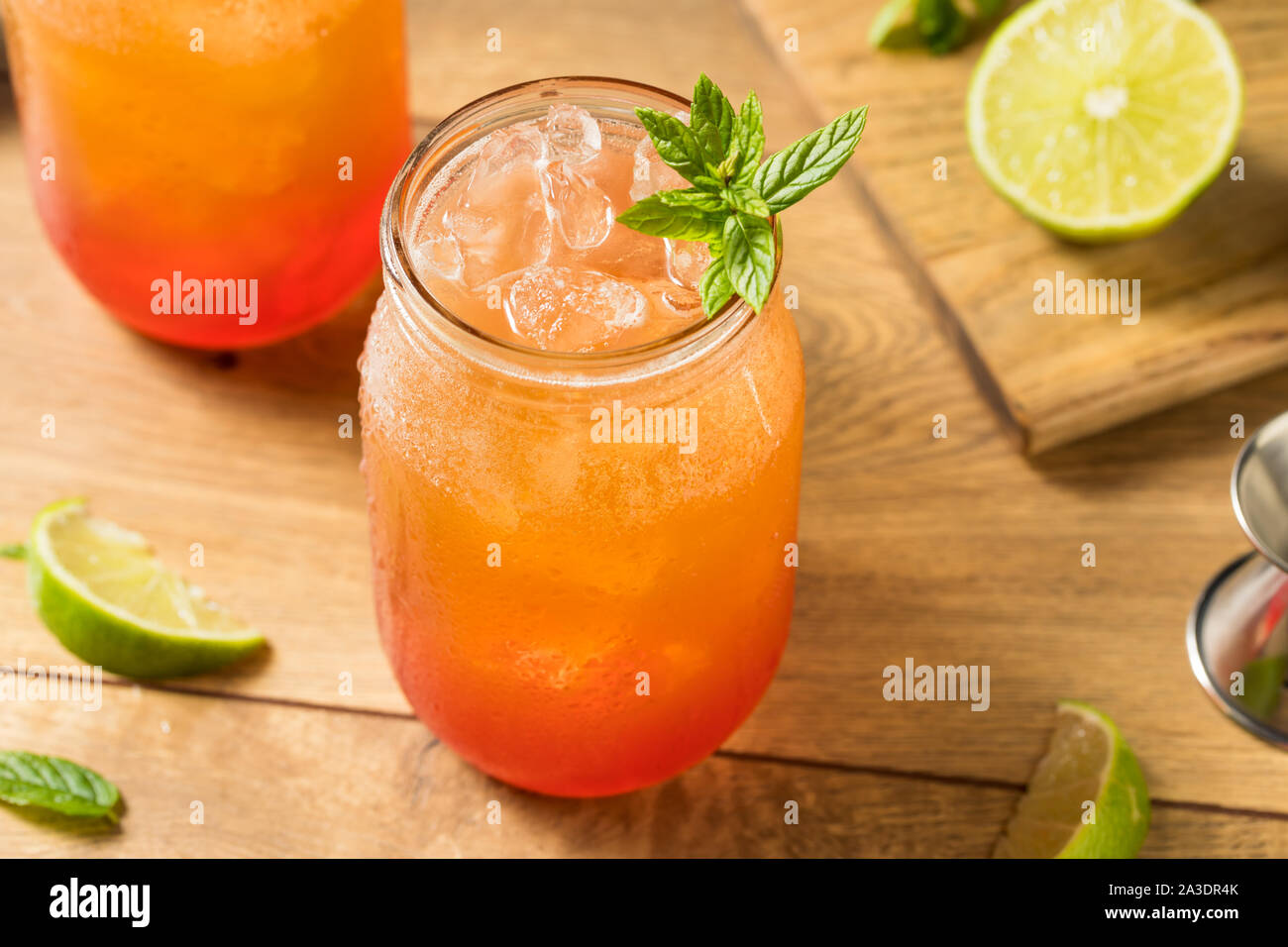 Homemade Sweet Planters Punch with Lime and Mint Stock Photo