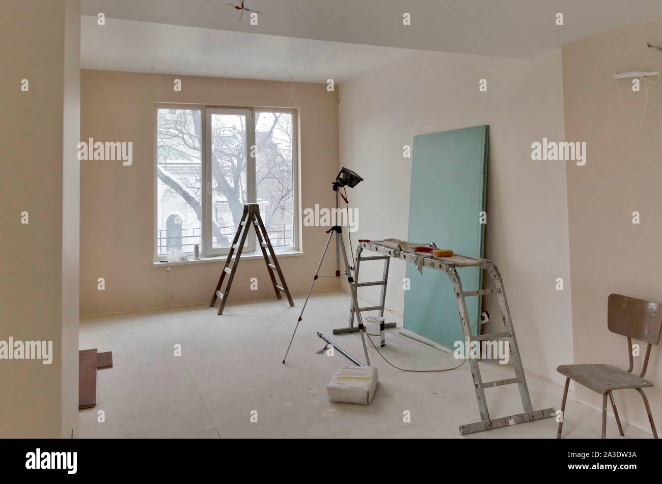 Room renovation with some painting tools available, Sofia, Bulgaria Stock Photo