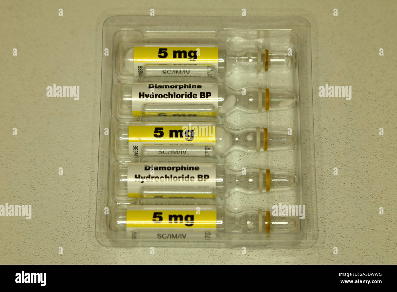 five diamorphine ampoules  of 5 mg each in  plastic tray packaging Stock Photo