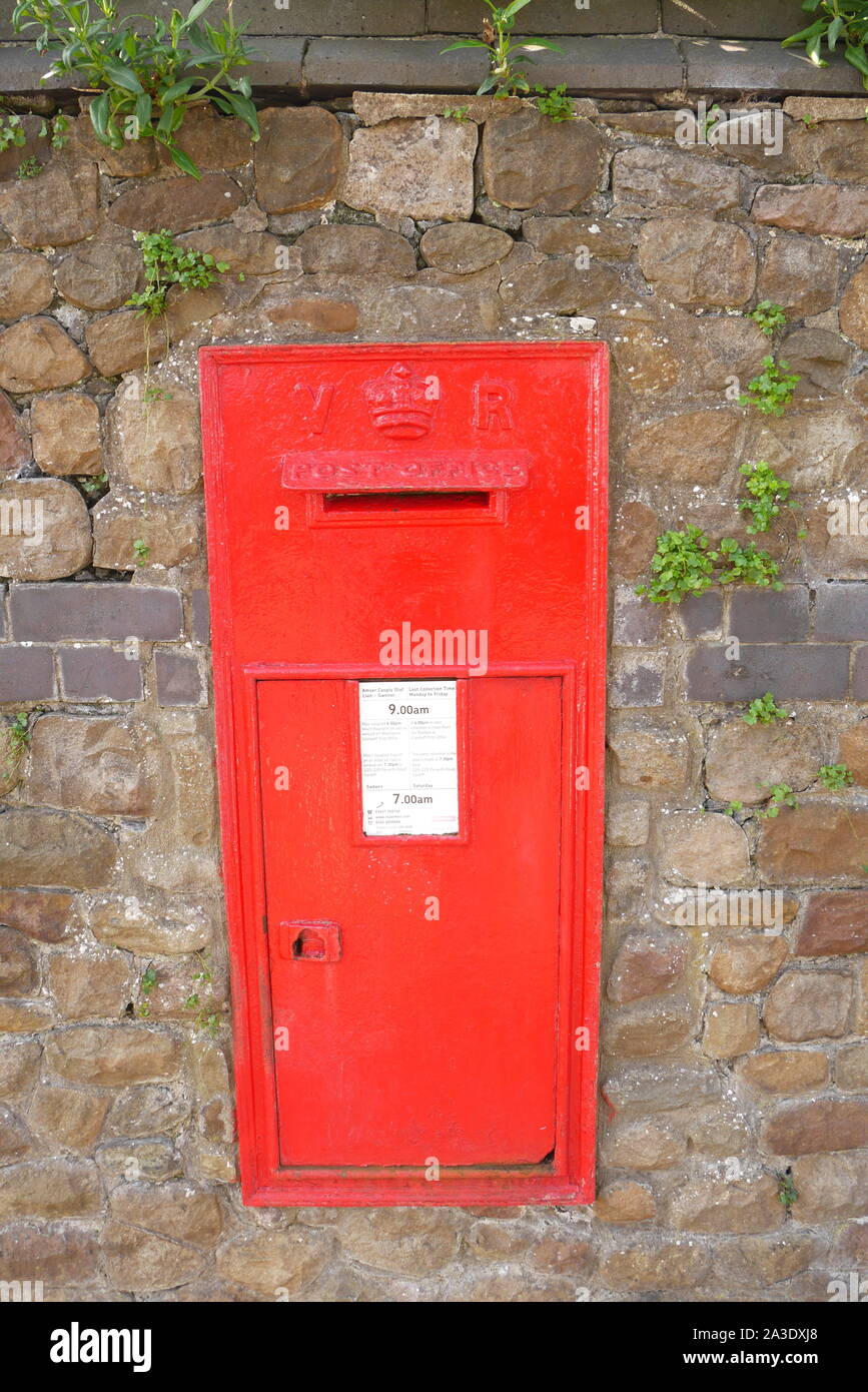 Bilingual Victorian post box set in a wall,  Llandaff, Cardiff, Wales, United Kingdom Stock Photo