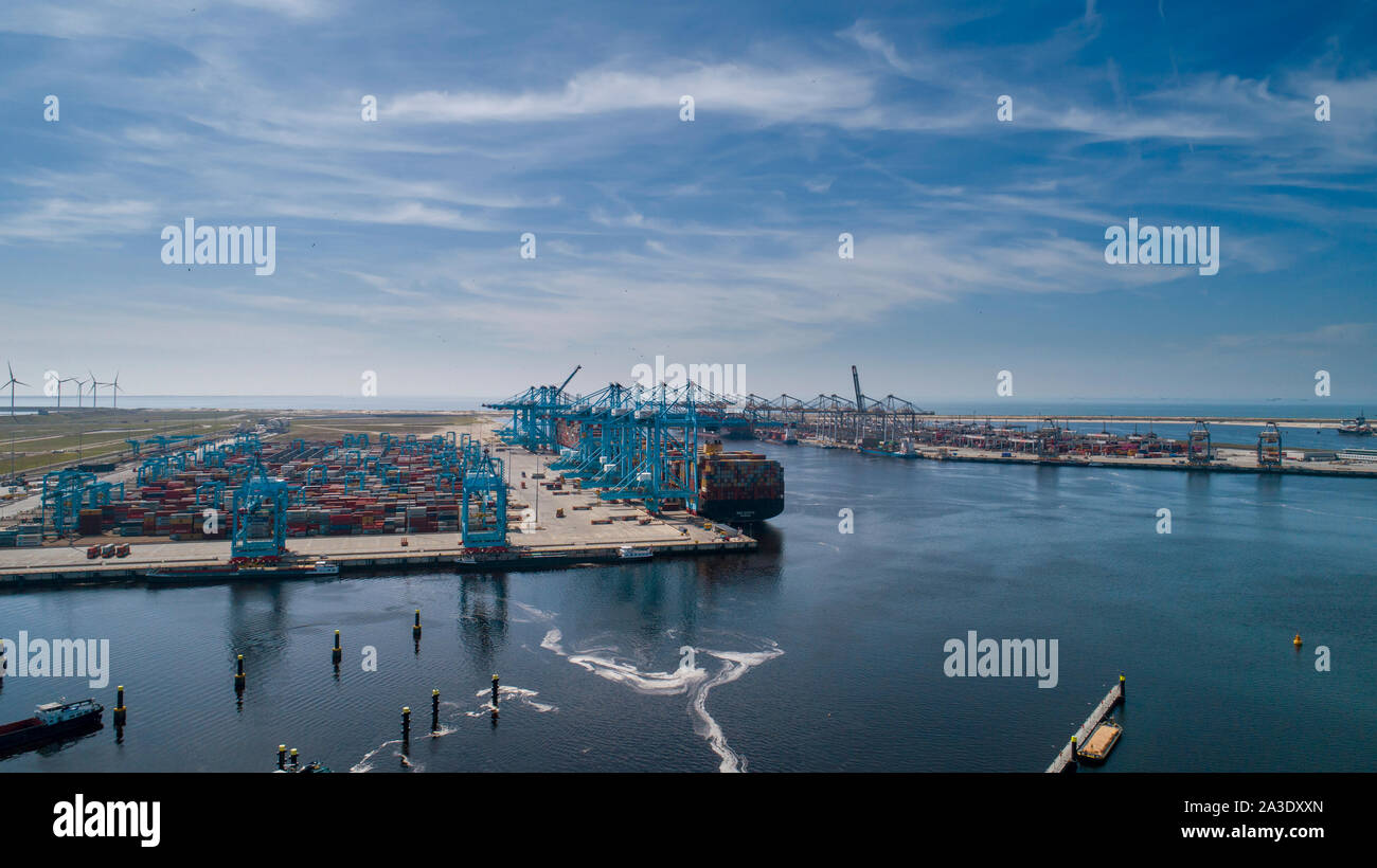 Maasvlakte 2, Rotterdam. Aerial view of container terminal in the harbor MAASVLAKTE, Netherlands. A large containership is unloading Stock Photo