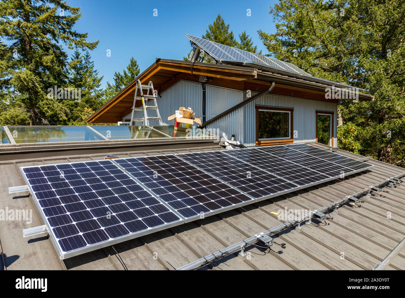 Solar photovoltaic panel installation on a homeowners roof in British