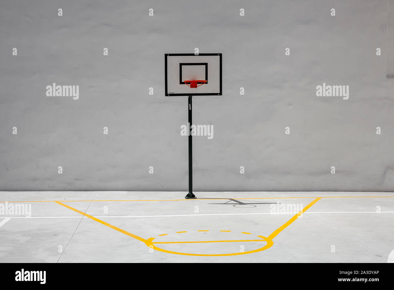 Basketball Hoop and Court With White Backboard with Room for Copy Stock Photo