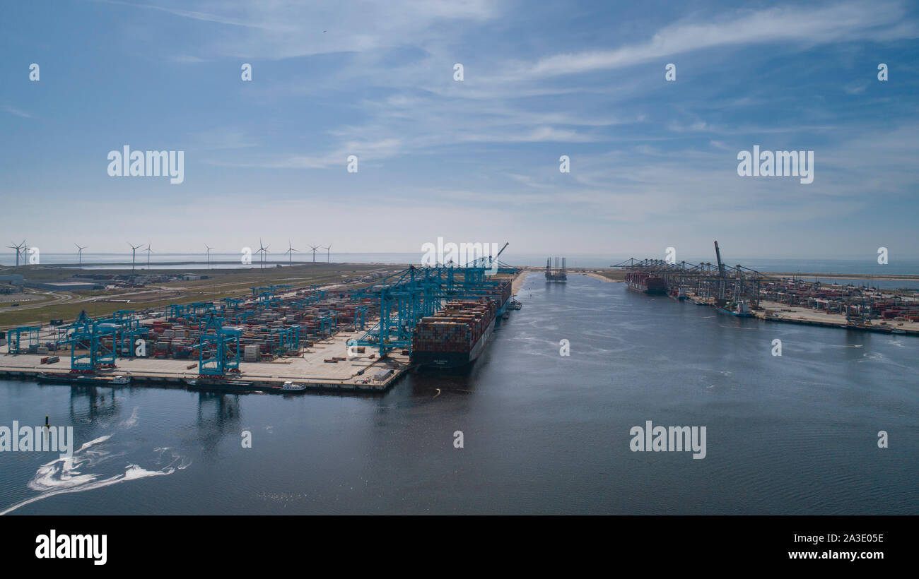 Rotterdam, Holland. Aerial view of container terminal in the harbor MAASVLAKTE, Netherlands. A large containership is unloading Stock Photo