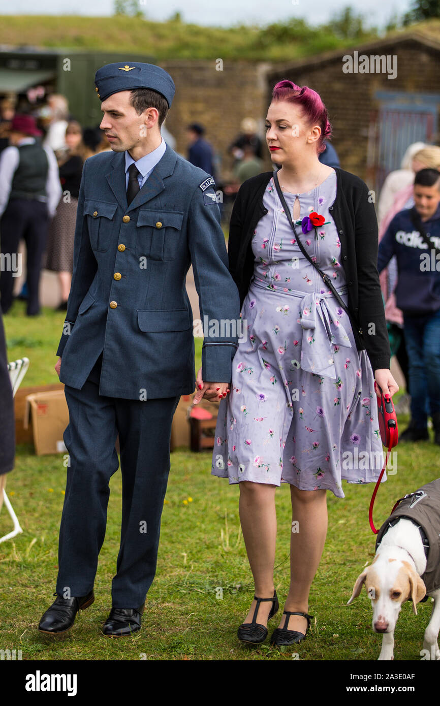 A male and female couple. One dressed in RAF military uniform other in period dress.Hope and Glory 2019 Gravesend Fort Gardens .Credit Andrew Beck Stock Photo