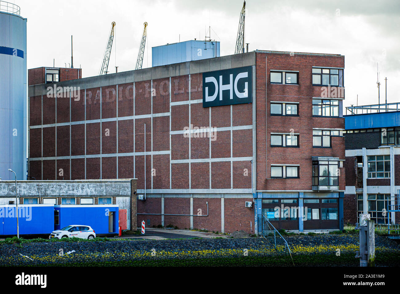 Former Radio Holland building, now with a DHG sign outside. Rotterdam  Harbour Stock Photo - Alamy