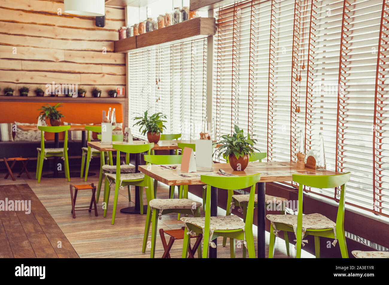 Bright cafe interior design concept in ecological natural style. Wooden ...