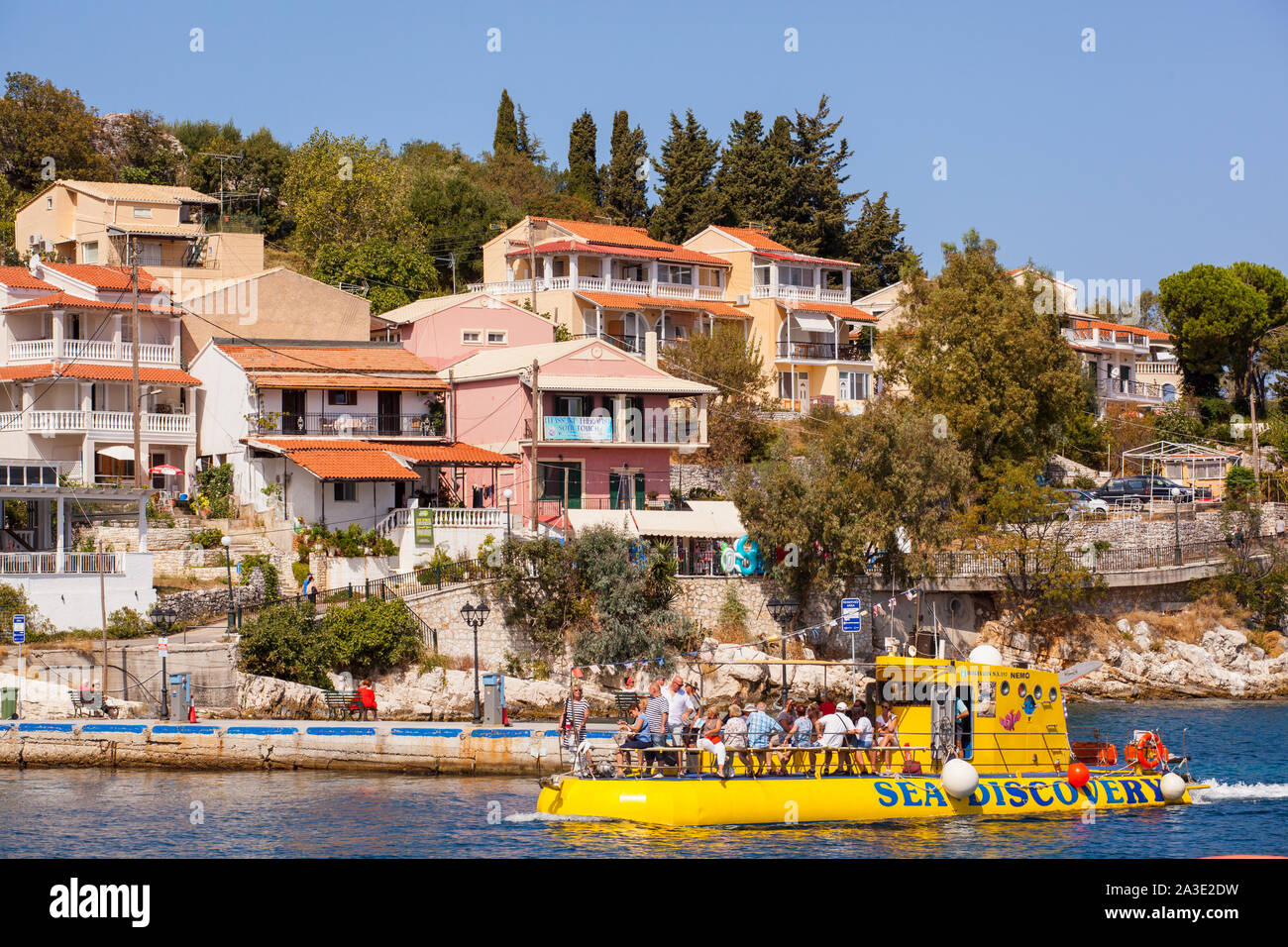 View of the harbour and waterside bars and tavernas in the Greek
