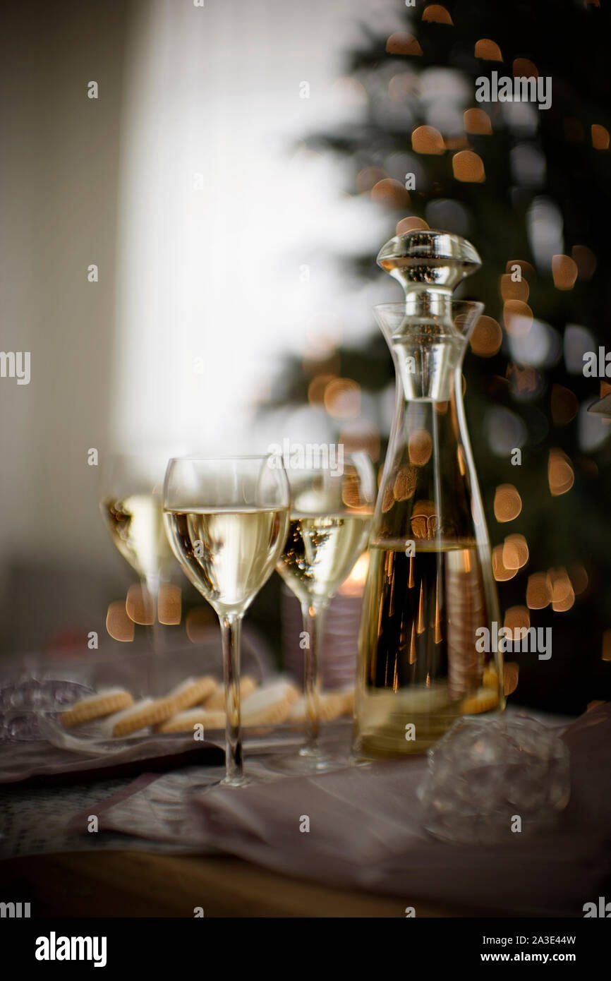 Glass wine decanter and wine glasses. Stock Photo