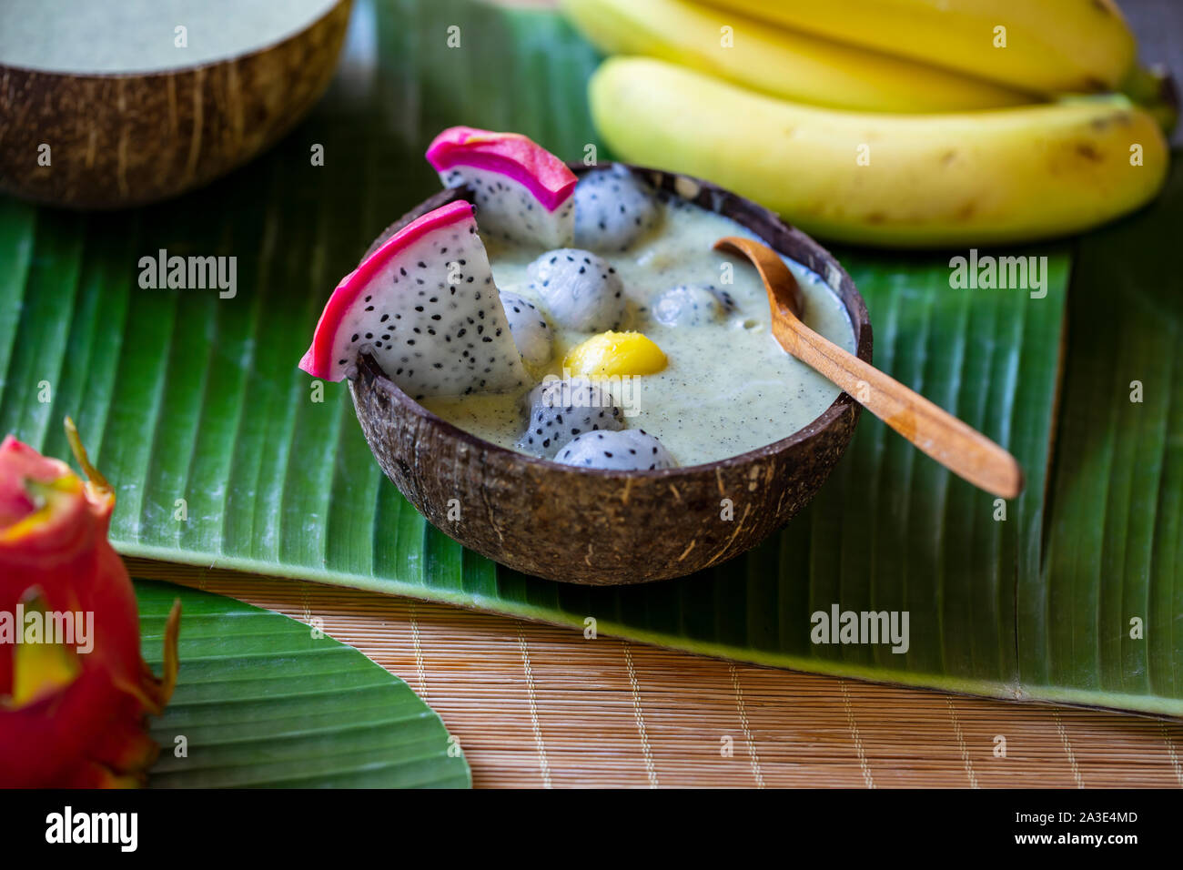 Dragon fruit smoothie in coconut bowl Stock Photo